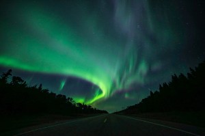Northern lights over highway in Saskatchewan